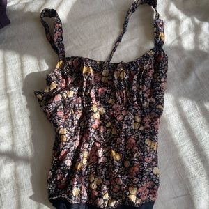 Abercrombie and Fitch body suit. Lightly warn. Size xs.Floral Print.